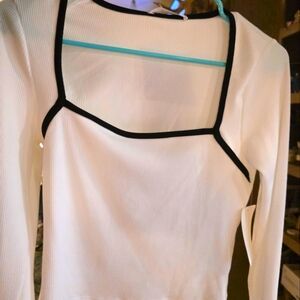 Elegant White Long Sleeve Top with Black Trim